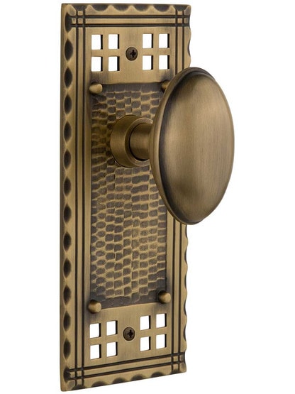 Pasadena Door Set with Oval Knobs in Antique Brass.